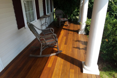 freshly sealed wood deck boards showing natural grain after deck restoration in Littleton MA