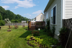 restored mahogany porch floor at front entry in Littleton Massachusetts finished by Finish Masters