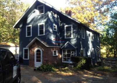 Exterior house painting and renovation services.