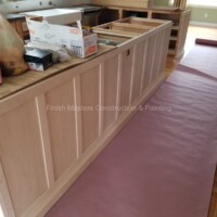 Interior kitchen renovation with painted cabinets. Kitchen cabinet painting process.