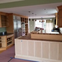 Modern kitchen with custom cabinetry and fresh paint, showcasing expert renovation services. Kitchen remodeling and painting by Finish Masters Construction & Painting.