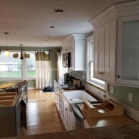 Quality kitchen painting and cabinet refinishing by Finish Masters Construction & Painting. Kitchen renovation with fresh paint and cabinetry.