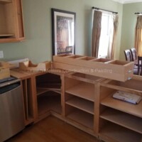 Kitchen renovation with new custom cabinets and modern design. Custom kitchen cabinets being assembled for a renovation project.