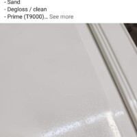 Cabinet painting mishap showing paint bubbles and uneven surface, highlighting the importance of professional finishing. Close-up of a cabinet with paint bubbles caused by poor painting techniques.