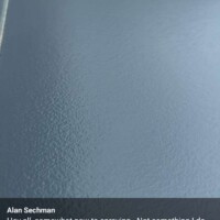 Expert cabinet painting by Finish Masters, showcasing a flawless, smooth surface for a professional look. Close-up of a freshly painted cabinet door with smooth, even finish.