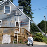 Freshly painted shake siding with a smooth, durable finish for long-lasting curb appeal. exterior painting contractor gambrell house painting
