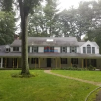 Exterior house painting and renovation services.