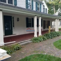 Exterior house painting and construction services by Finish Masters. Expert craftsmanship for a beau.