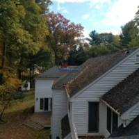 Roof repair service for residential home.