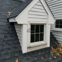 Roof and siding repair with professional painting services.