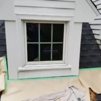 Window renovation and exterior painting by Finish Masters Construction & Painting.