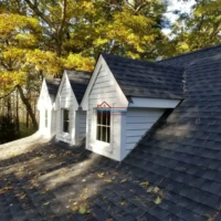 Roof with dormer windows after renovation.
