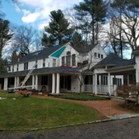 Exterior house painting and renovation by Finish Masters Construction & Painting.