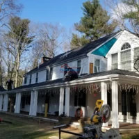 Exterior house painting and renovation by Finish Masters Construction & Painting.