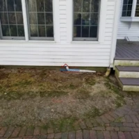 Exterior house painting and renovation work.