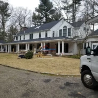 Exterior house painting and renovation services.