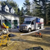Construction & Painting Service Vehicle at Worksite.