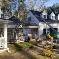 Exterior home painting and renovation project.