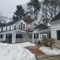Residential house exterior painted by Finish Masters Construction & Painting in winter.