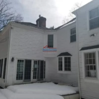Exterior house painting and renovation services.
