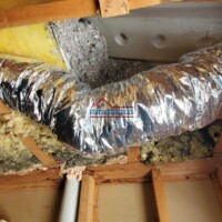 Professional ductwork installation by Finish Masters Construction & Painting. Quality HVAC duct installation in a residential attic.