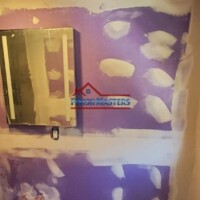 Professional interior wall repair and painting by Finish Masters Construction & Painting. Expert craftsmanship for a flawless finish. Interior wall repair and painting services.