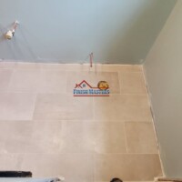 Tile floor install into this bathroom renovation project Bathroom Remodeling Contractor in Chelmsford MA