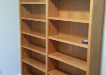 Refinished wooden bookshelf in Concord MA for cabinet refinishing project.