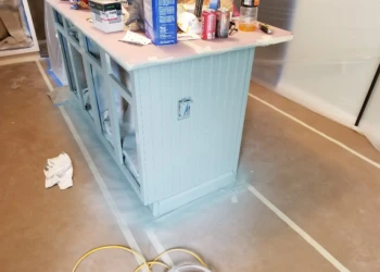 Kitchen island with beadboard paneling added during cabinet refinishing in Merrimack NH