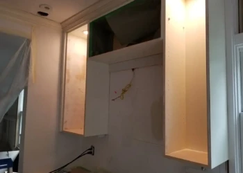 Newly installed upper custom kitchen cabinets without doors in Newton MA kitchen remodeling project