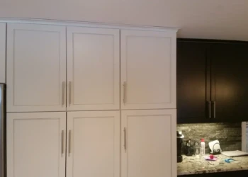 Two-tone kitchen cabinets with white and black finishes in a Sudbury MA kitchen countertop area