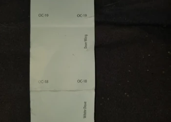 Benjamin Moore cabinet paint color samples with codes OC-20 to OC-17.
